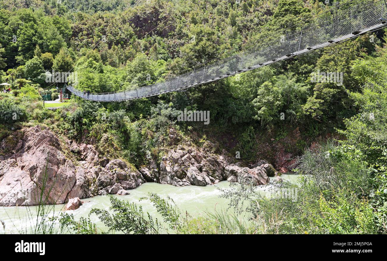 Buller gorge swingbridge - New Zealand Stock Photo