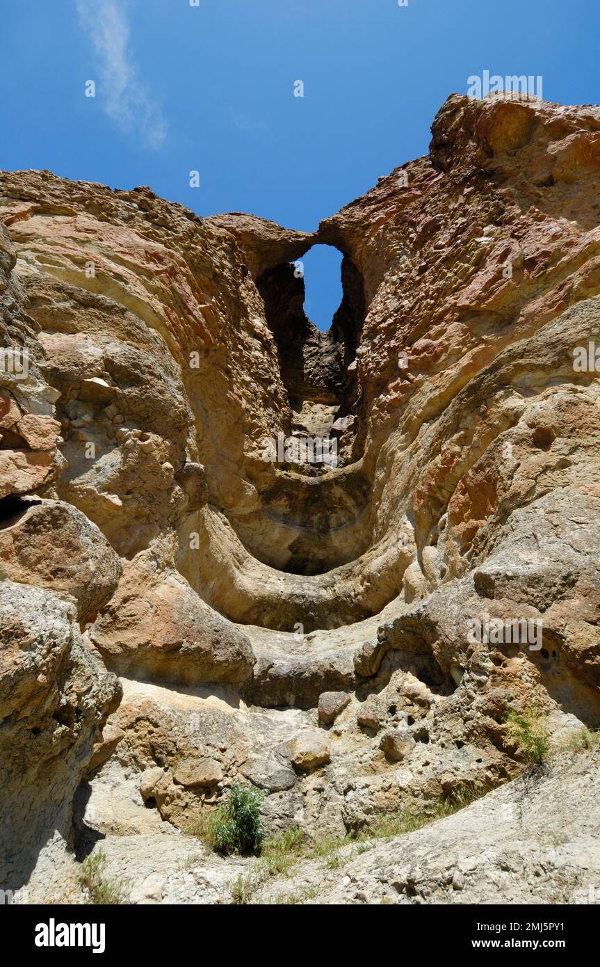 Arch in rock formation at the Clarno Unit of John Day Fossil Beds National Monument in eastern
