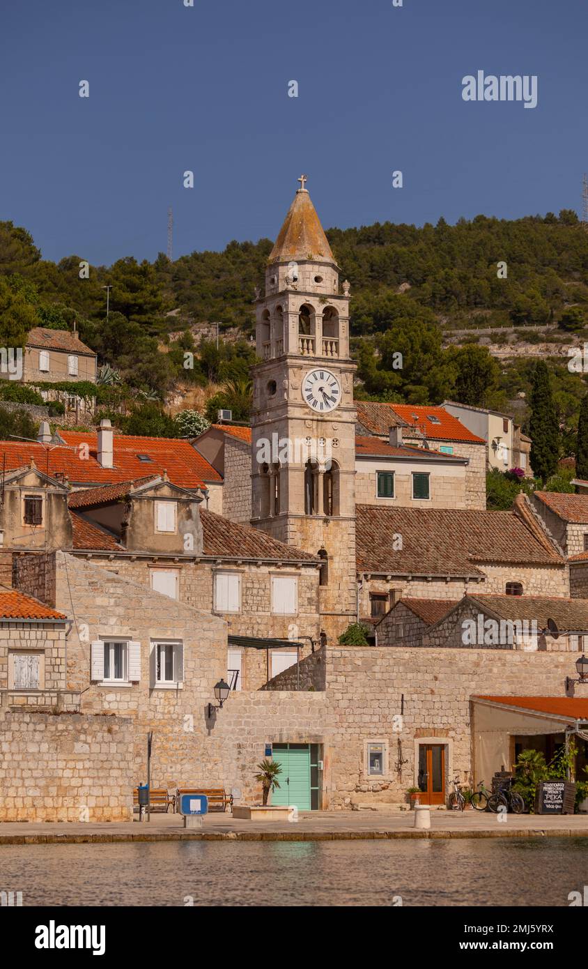 KUT, VIS, CROATIA, EUROPE - Bell tower, Church of St. Cyprian and Justina in old town of Vis, on the island of Vis. Stock Photo