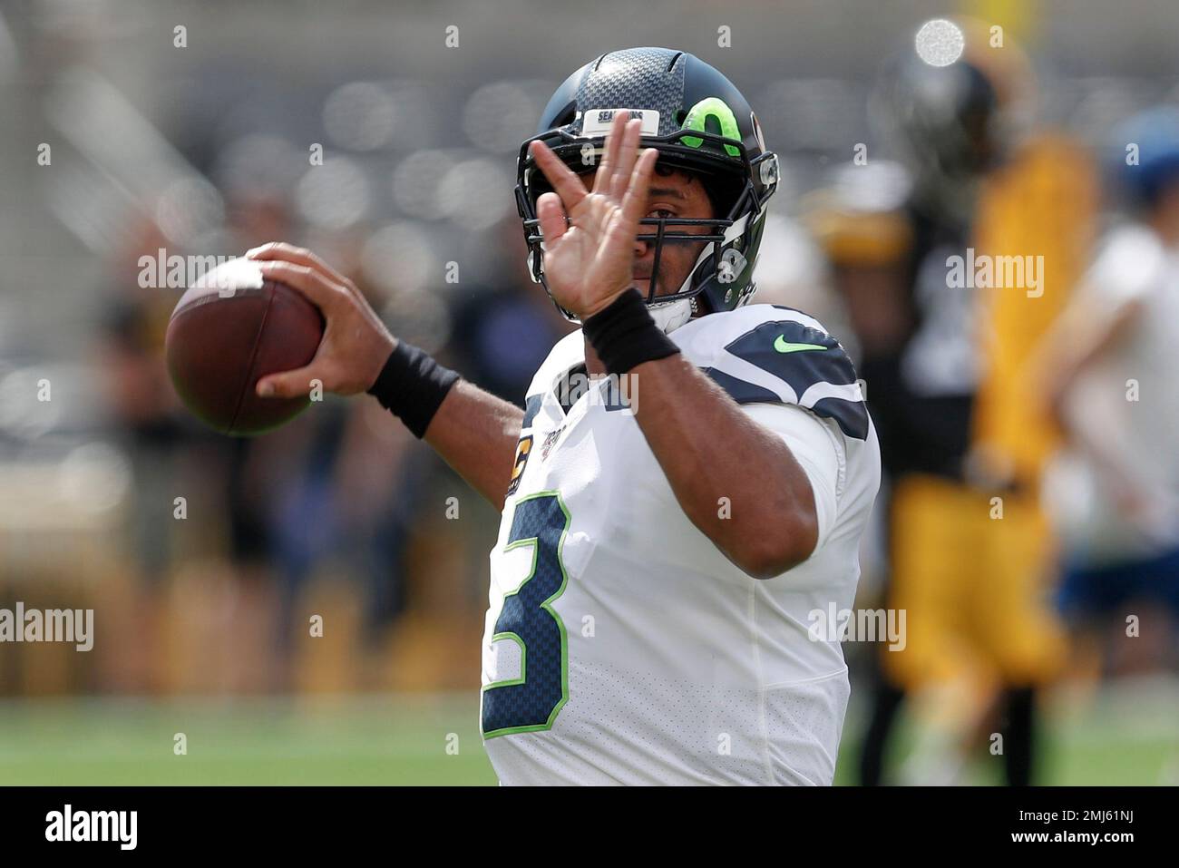 Seattle Seahawks quarterback Russell Wilson (3) warms up before an