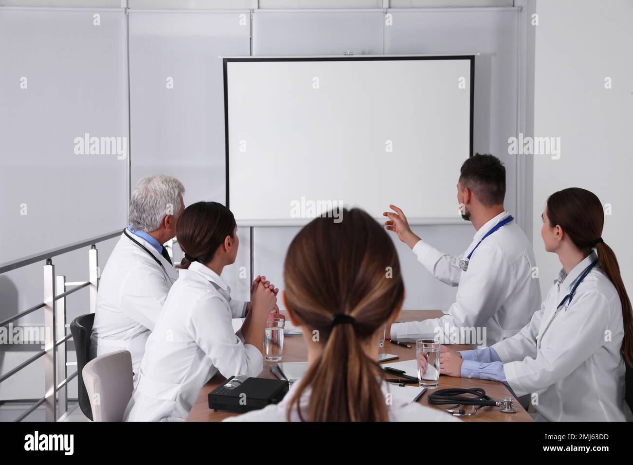 Old projector meeting hi-res stock photography and images - Alamy