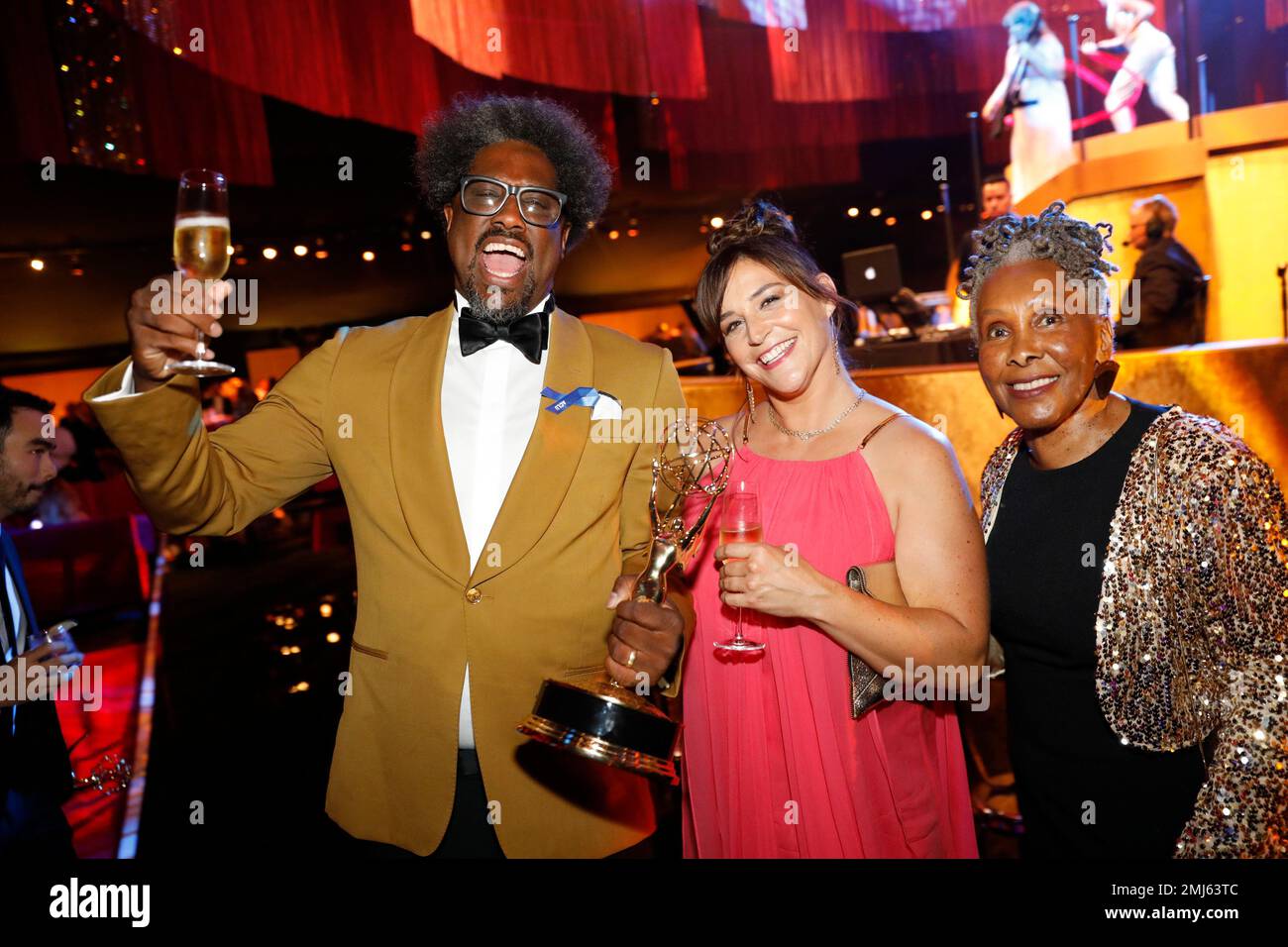W. Kamau Bell, from left, winner of the award for outstanding unstructured  reality program for "United Shades of America with W. Kamau Bell", Melissa  Bell, and Janet Cheatham Bell attend the Governors