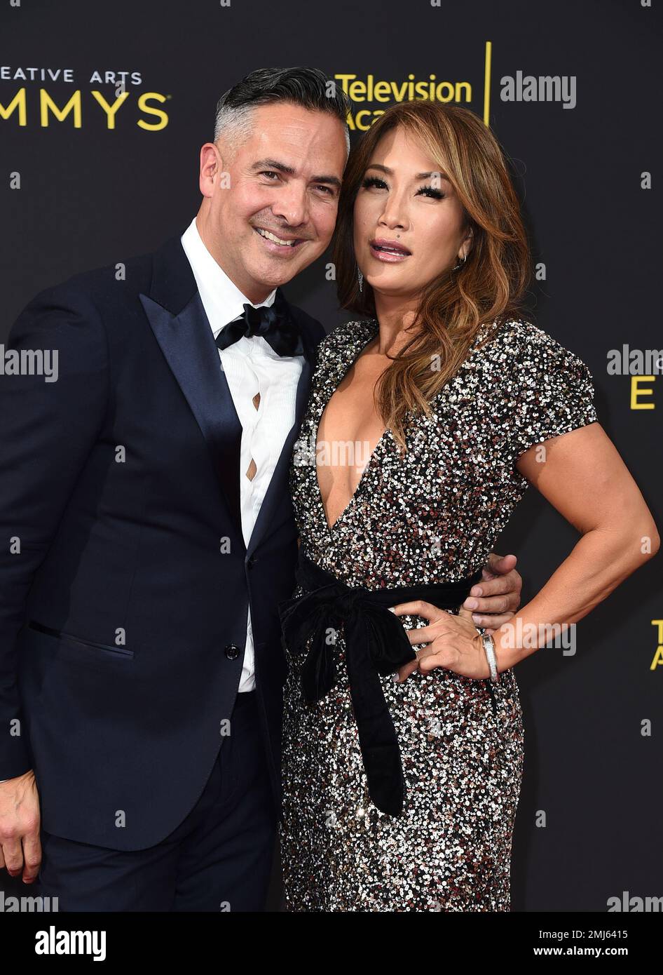 Raj Kapoor, left, and Carrie Ann Inaba arrive at night one of the ...