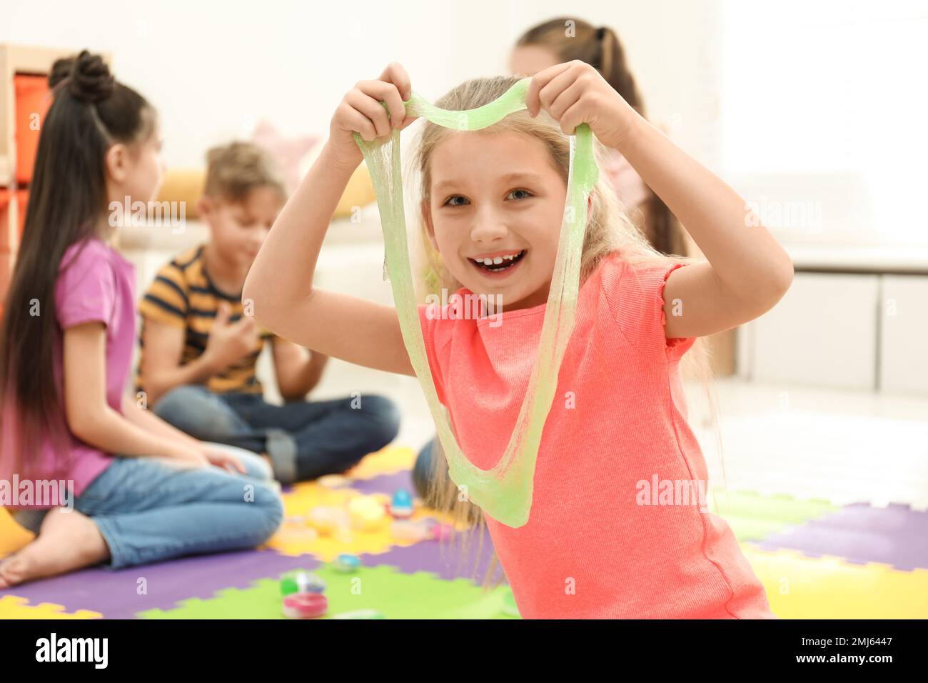 Little girl stretching hi-res stock photography and images - Alamy