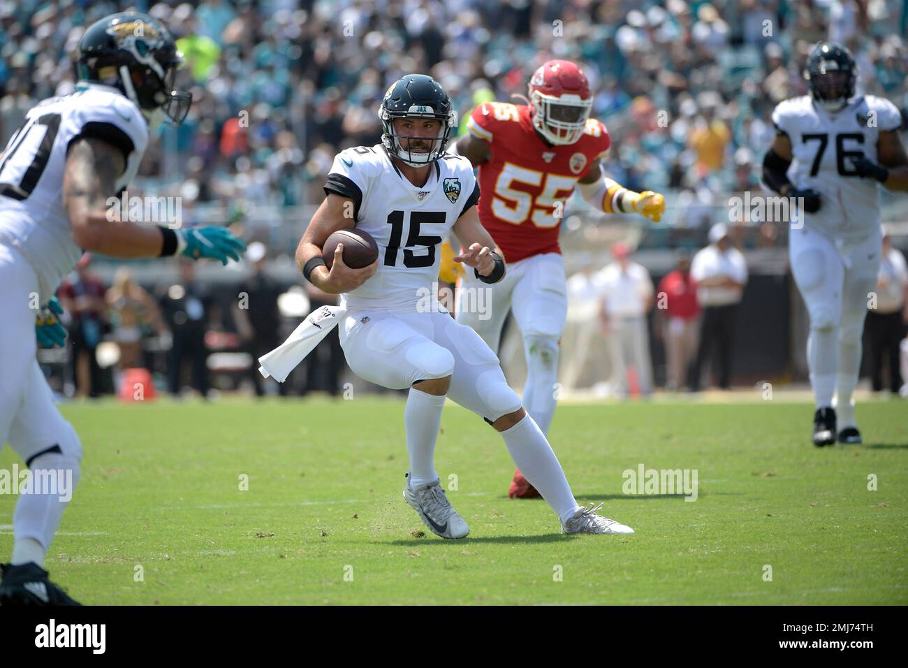 Jacksonville Jaguars quarterback Gardner Minshew (15) scrambles in