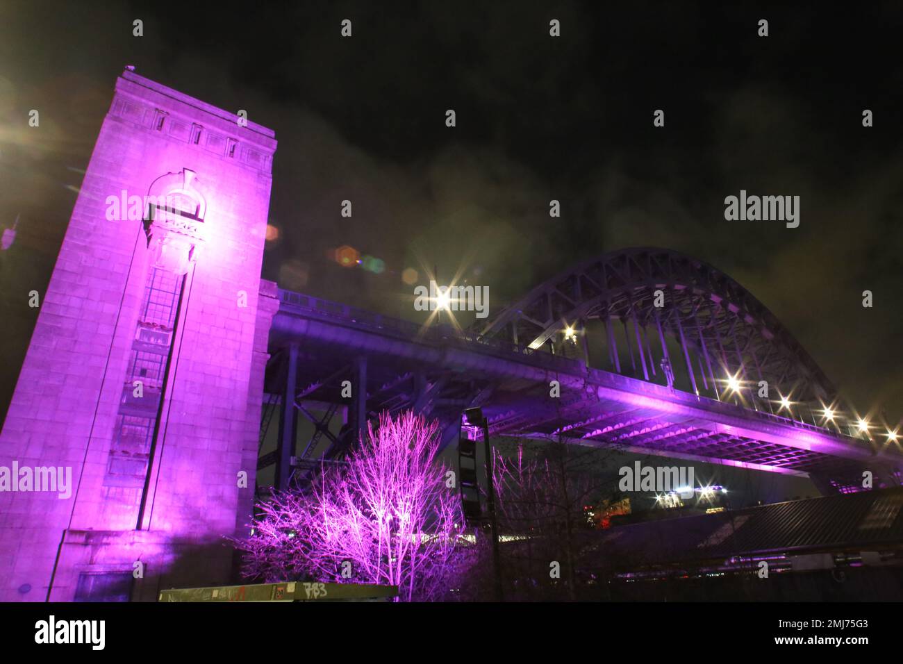 Newcastle, UK. 27th Jan 2023. Holocaust Memorial Day 2023, The theme of Holocaust Memorial Day 2023 is: ‘Ordinary People’ The Tyne Bridge, Millennium Bridge lit up to mark Holocaust Memorial Day, the River Tyne in a purple hue. Newcastle Civic Centre lit in memory of victims of the Holocaust and other genocides, in tribute to the survivors and to take a stand against prejudice, discrimination and hatred today, Newcastle upon Tyne, UK, 27th January 2023, Credit: DEW/Alamy Live News Stock Photo
