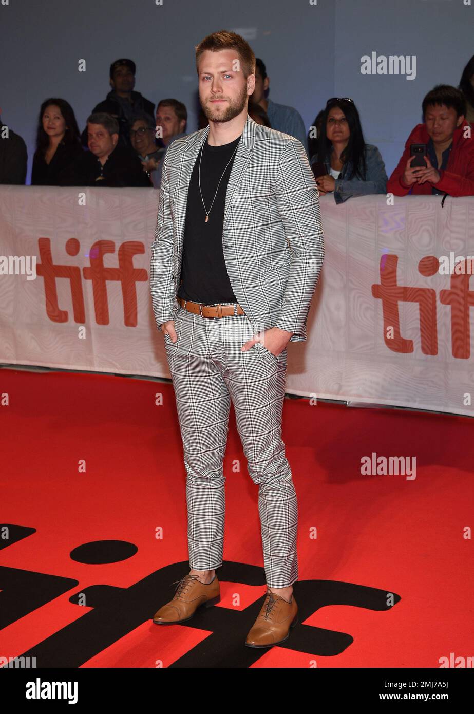 Carl Lundstedt attends a premiere for "The Joker" on day five of the
