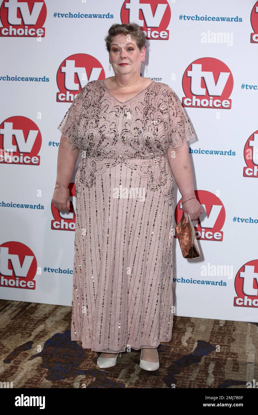 TV personality Anne Hegarty poses for photographers on arrival at the