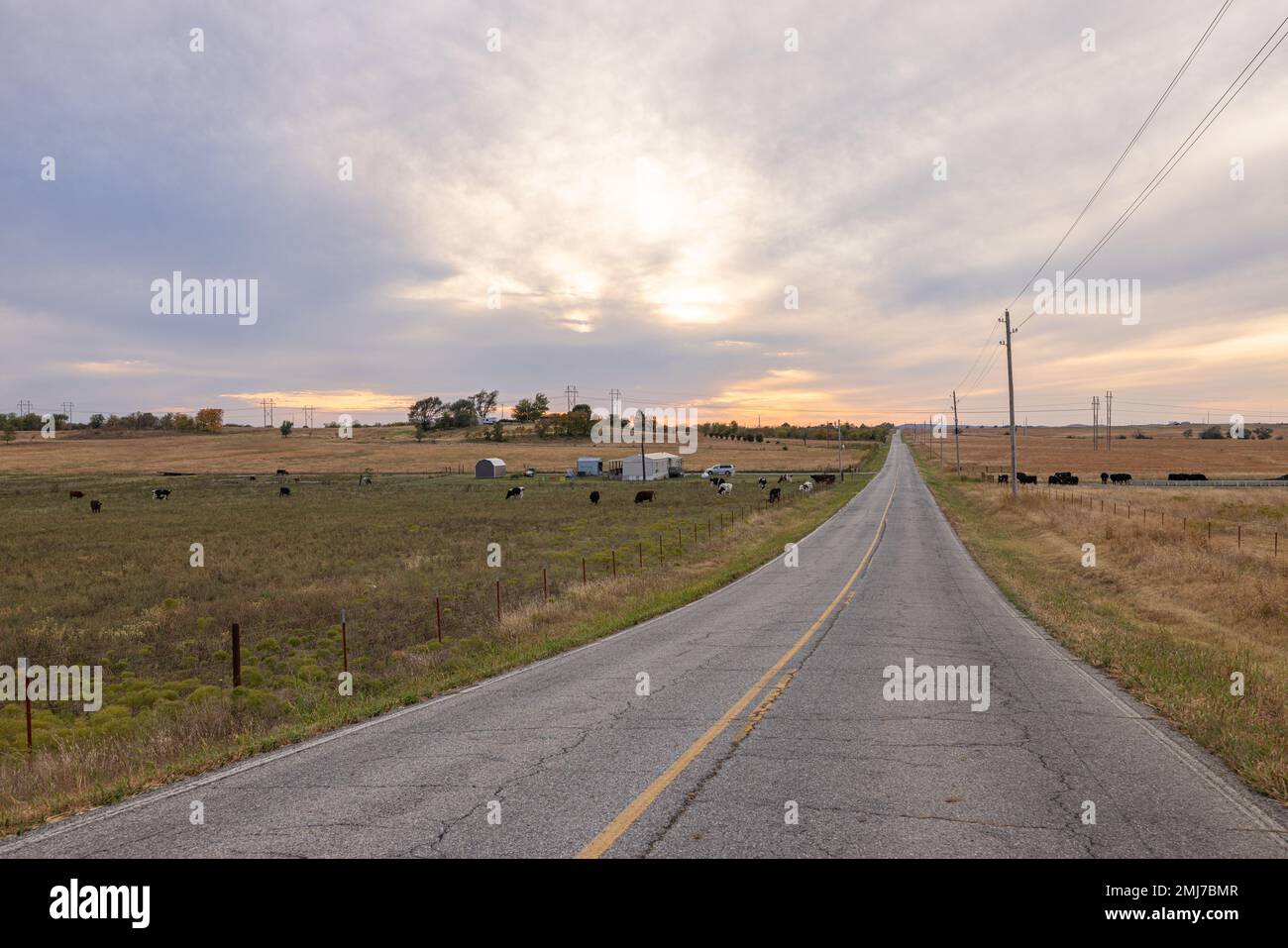 Adair, Oklahoma, USA October 16, 2022 Farm with sunset while driving