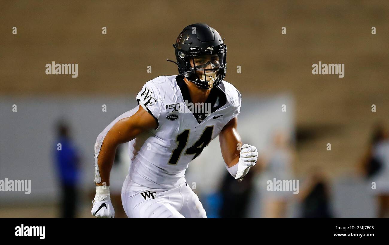 Wake Forest wide receiver Sage Surratt (14) runs a pass route during an