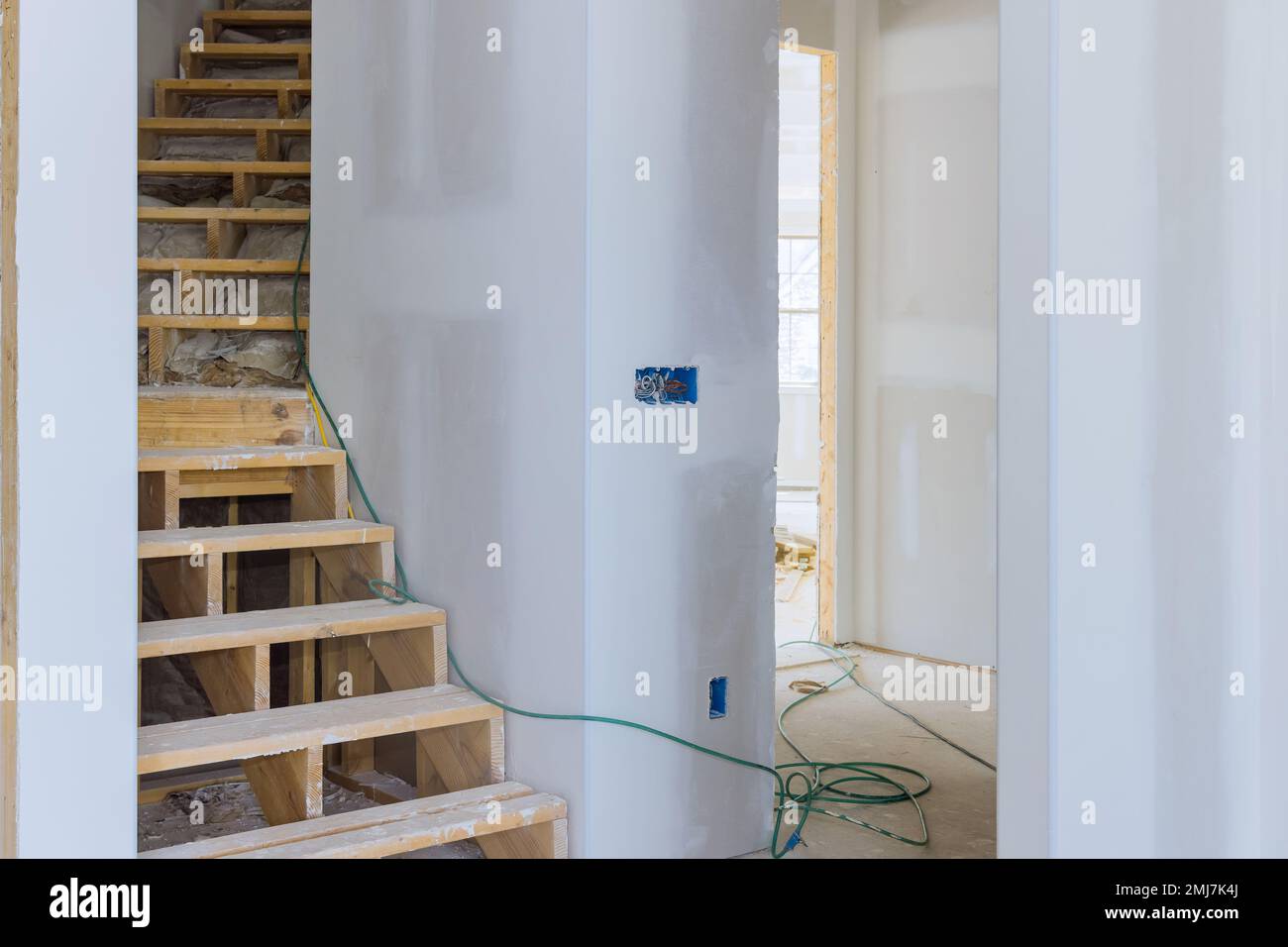 In new construction of house plastering drywalling has been completed