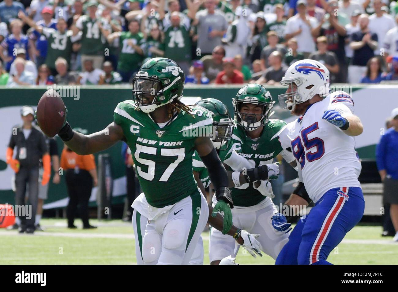 New York Jets inside linebacker C.J. Mosley (57) celebrates after recovering a fumble during the first half of an NFL football game against the Buffalo Bills Sunday, Sept. 8, 2019, in East Rutherford, N.J. (AP Photo/Bill Kostroun) Stock Photo