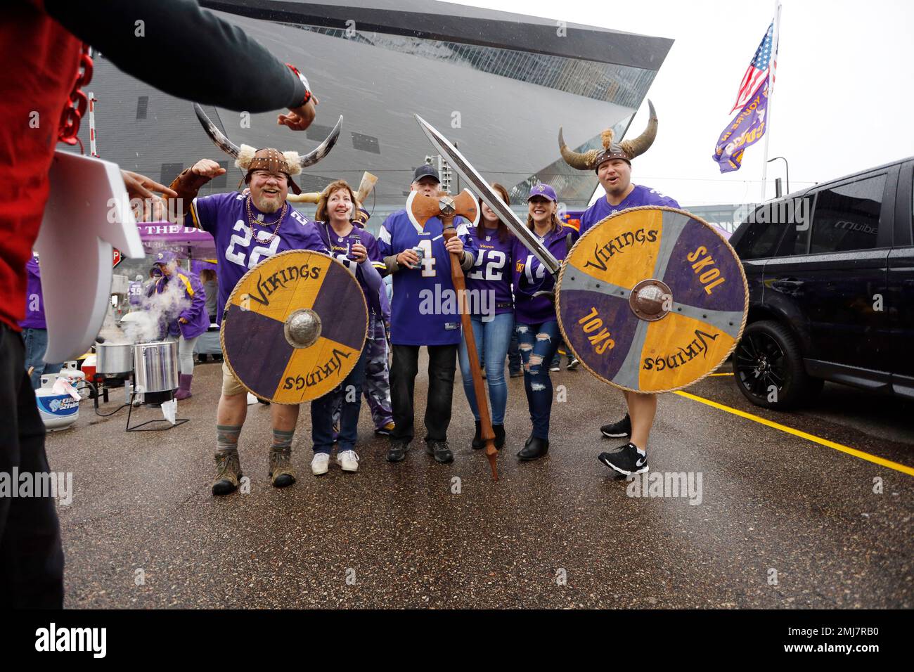 Fans tailgate before an NFL football game between the Atlanta