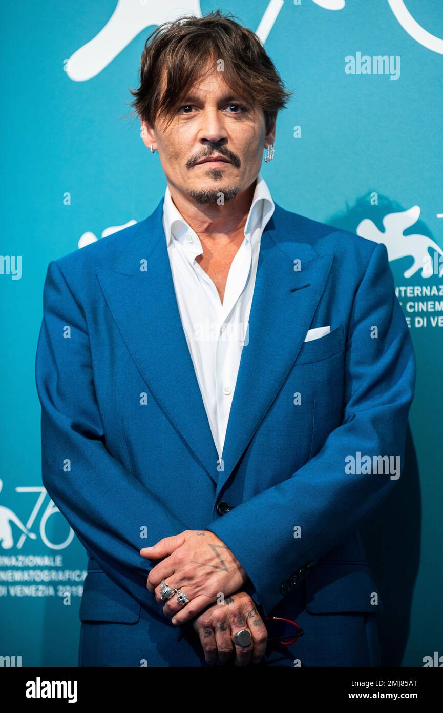 Actor Johnny Depp poses for photographers at the photo call for the ...