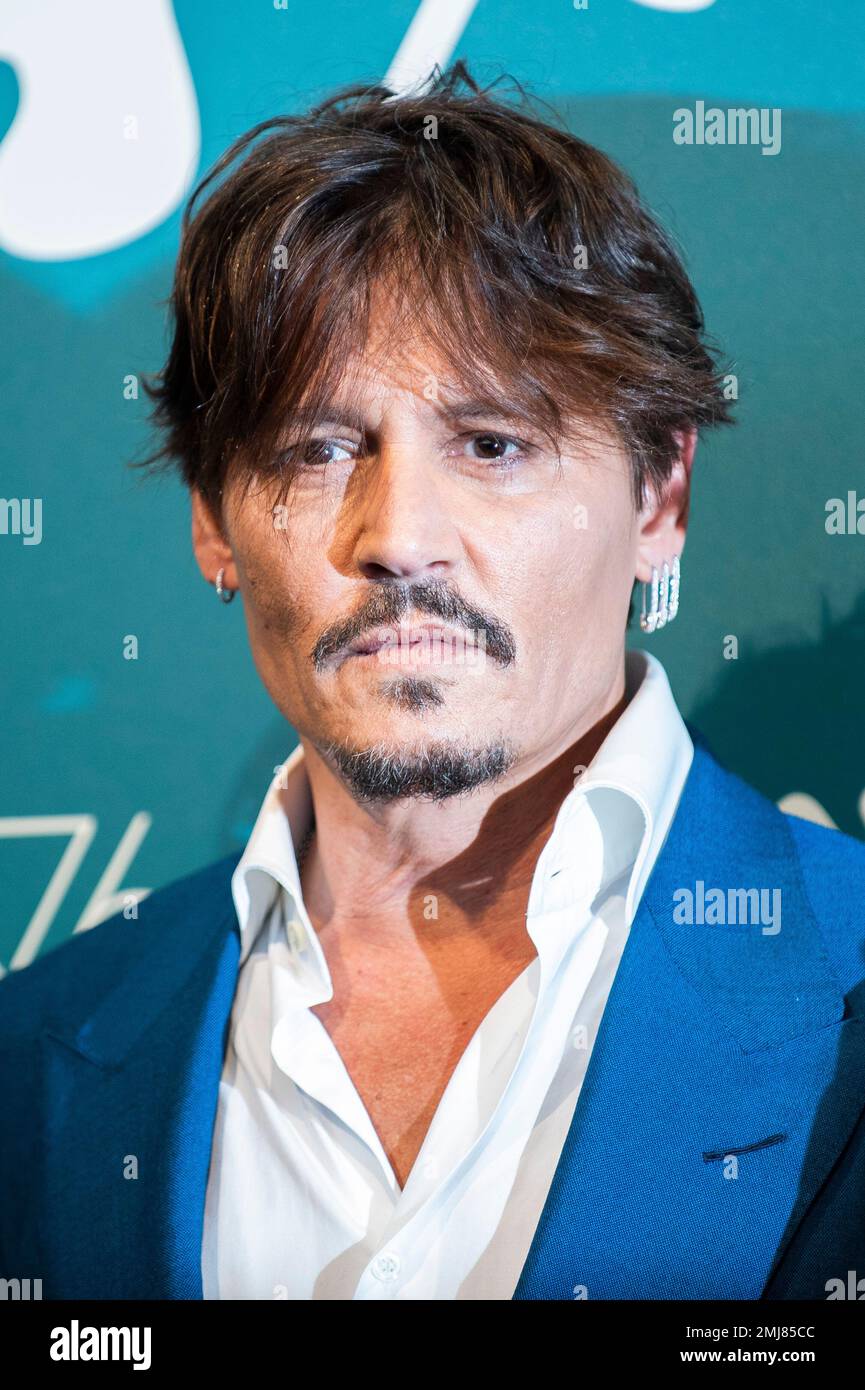 Actor Johnny Depp poses for photographers at the photo call for the ...