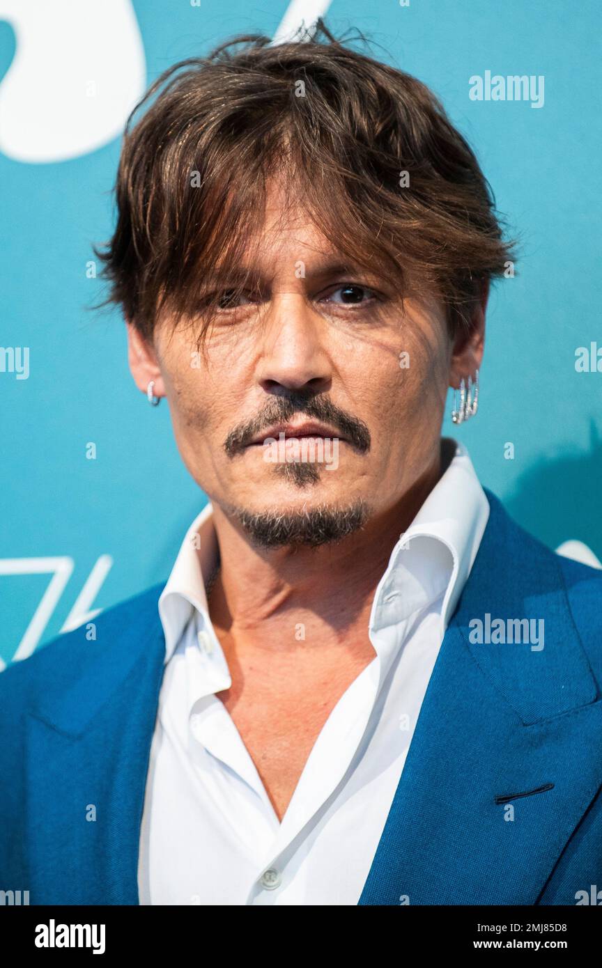 Actor Johnny Depp poses for photographers at the photo call for the ...