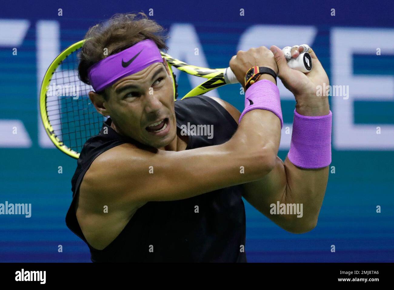 Rafael Nadal, of Spain, returns a shot to Matteo Berrettini, of Italy, during the mens singles semifinals of the U.S. Open tennis championships Friday, Sept