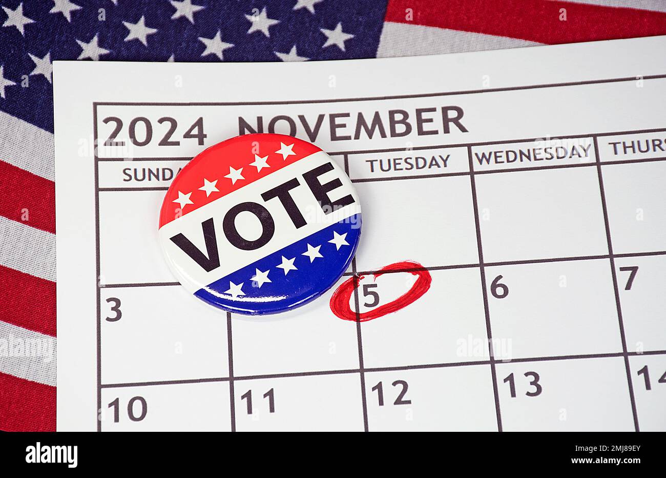 Flag vote button on Tuesday November 2024 calendar with a red circle Stock Photo