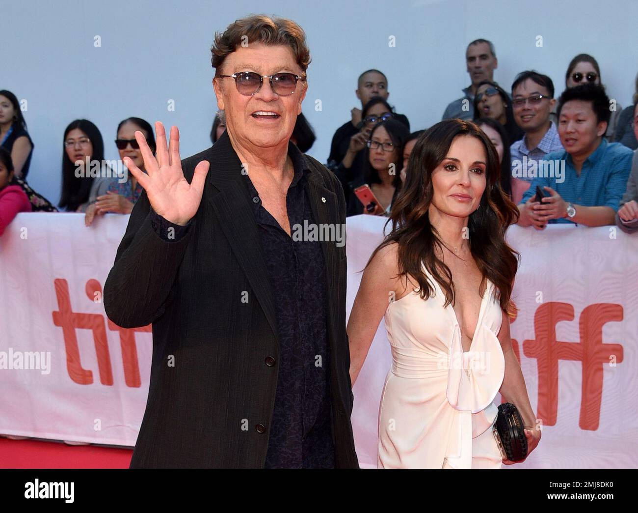 Robbie Robertson, left, and Janet Zuccarini attend the premiere for ...