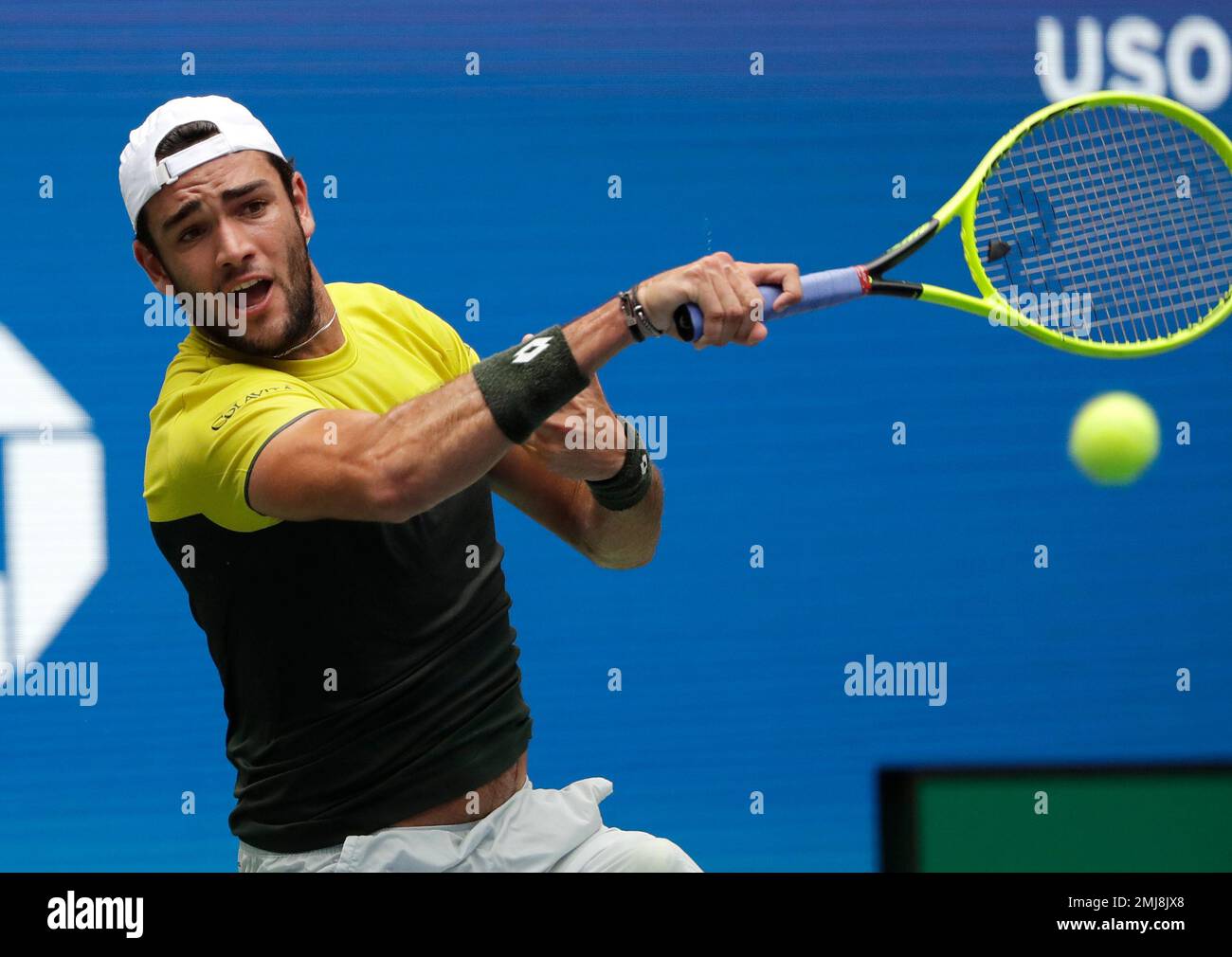 Matteo Berrettini, of Italy, returns to Gael Monfils, of France, during the quarterfinals of the U.S. Open tennis championships Wednesday, Sept