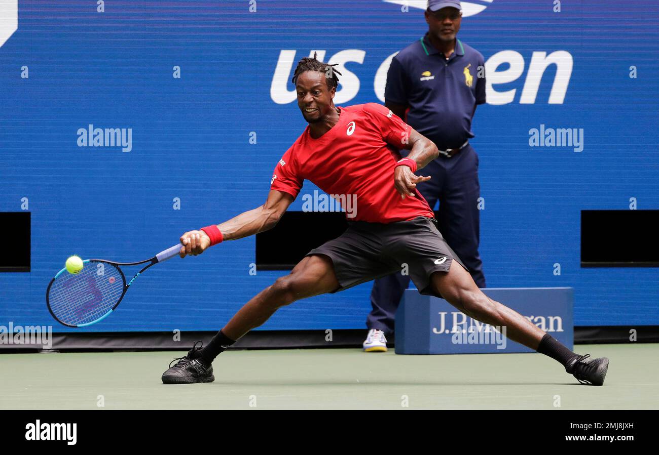 Gael Monfils, of France, returns to Matteo Berrettini, of Italy, during the quarterfinals of the U.S. Open tennis championships Wednesday, Sept