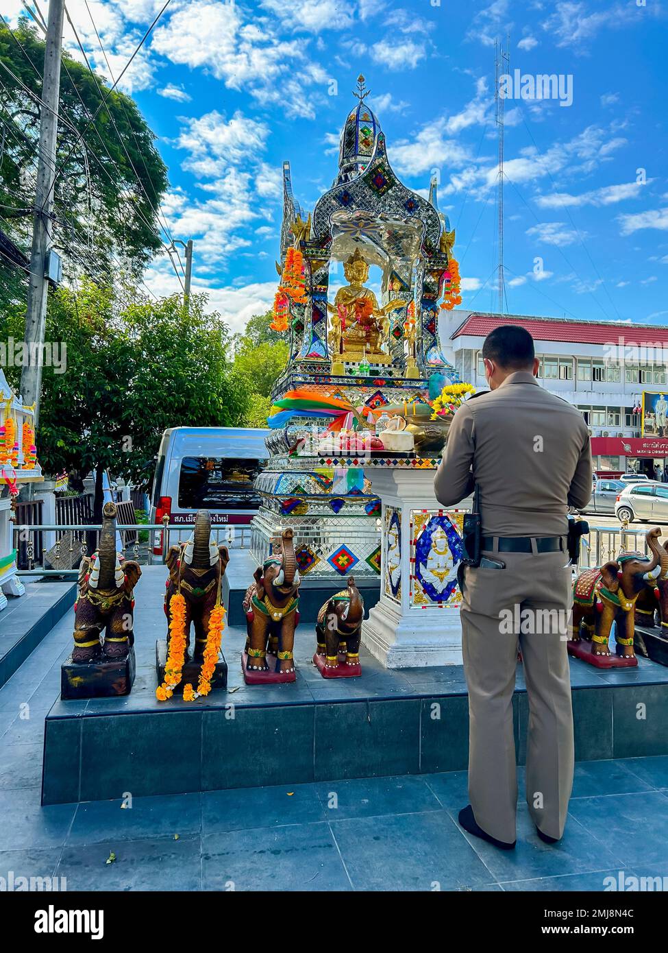 Mueang, Chiang Mai, Thailand, Thai Policeman Praying, From Behind