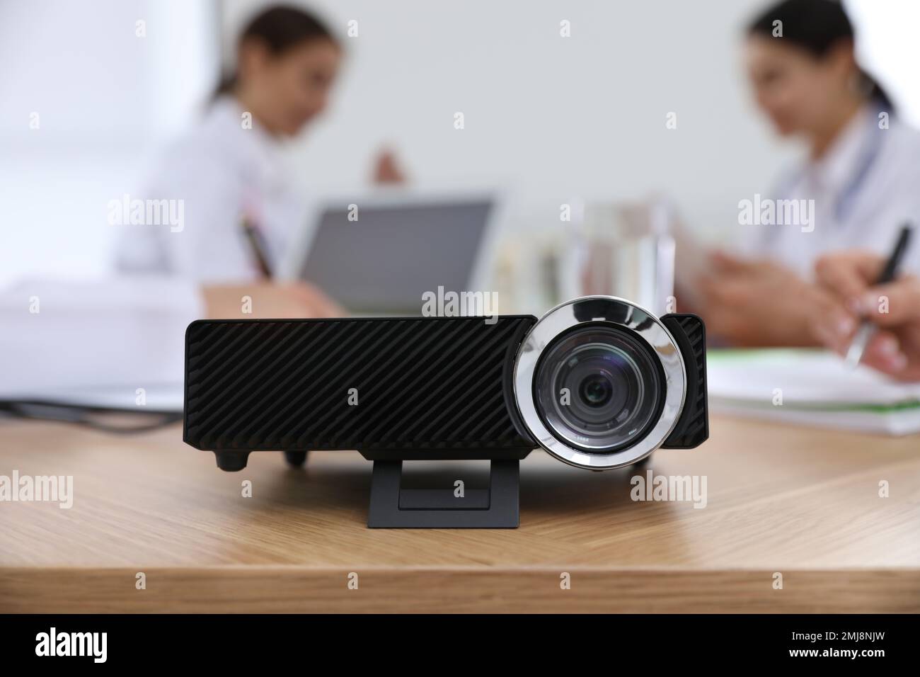 Video projector on table during medical conference Stock Photo - Alamy