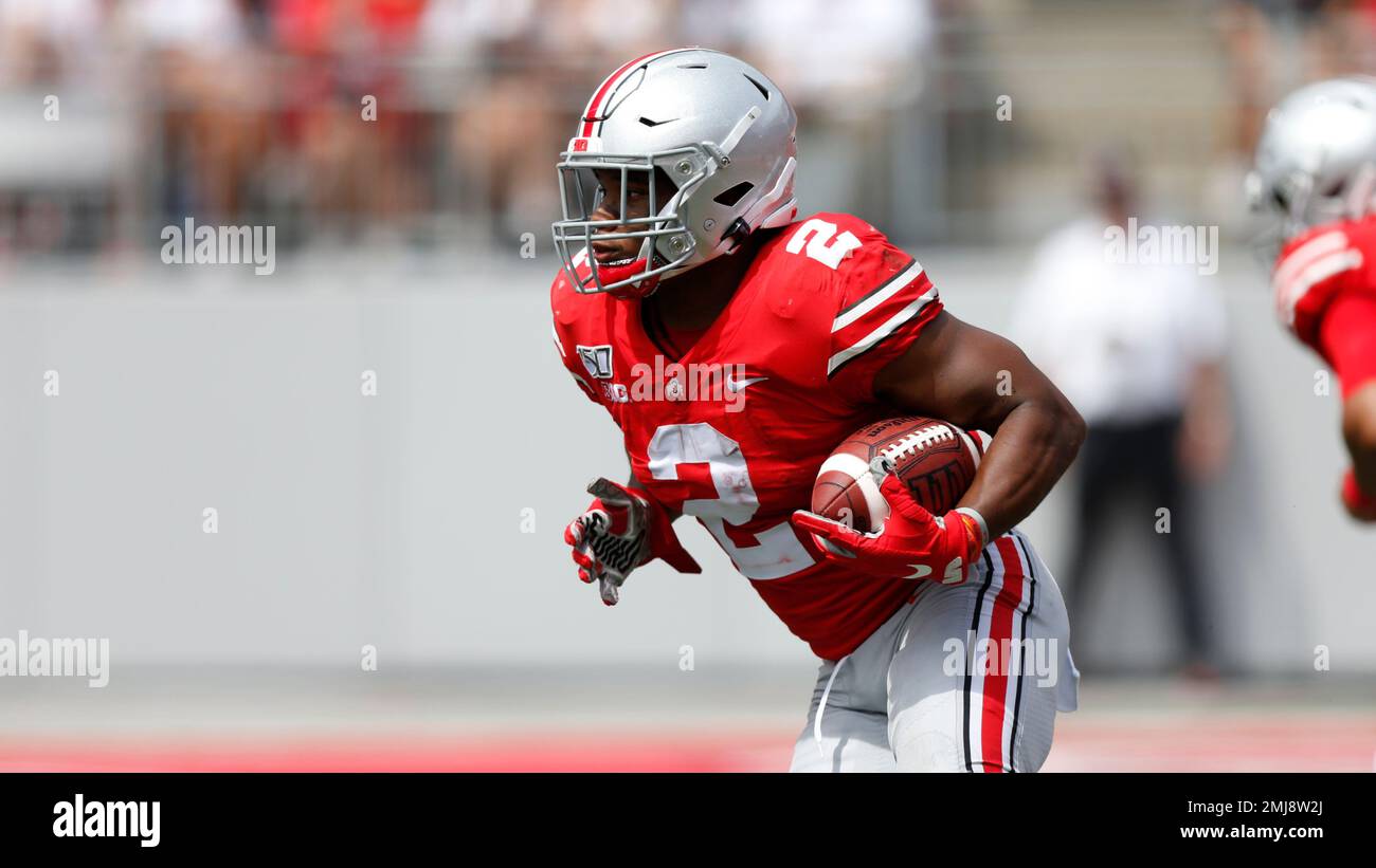 Ohio State running back J.K. Dobbins carries the ball against Florida
