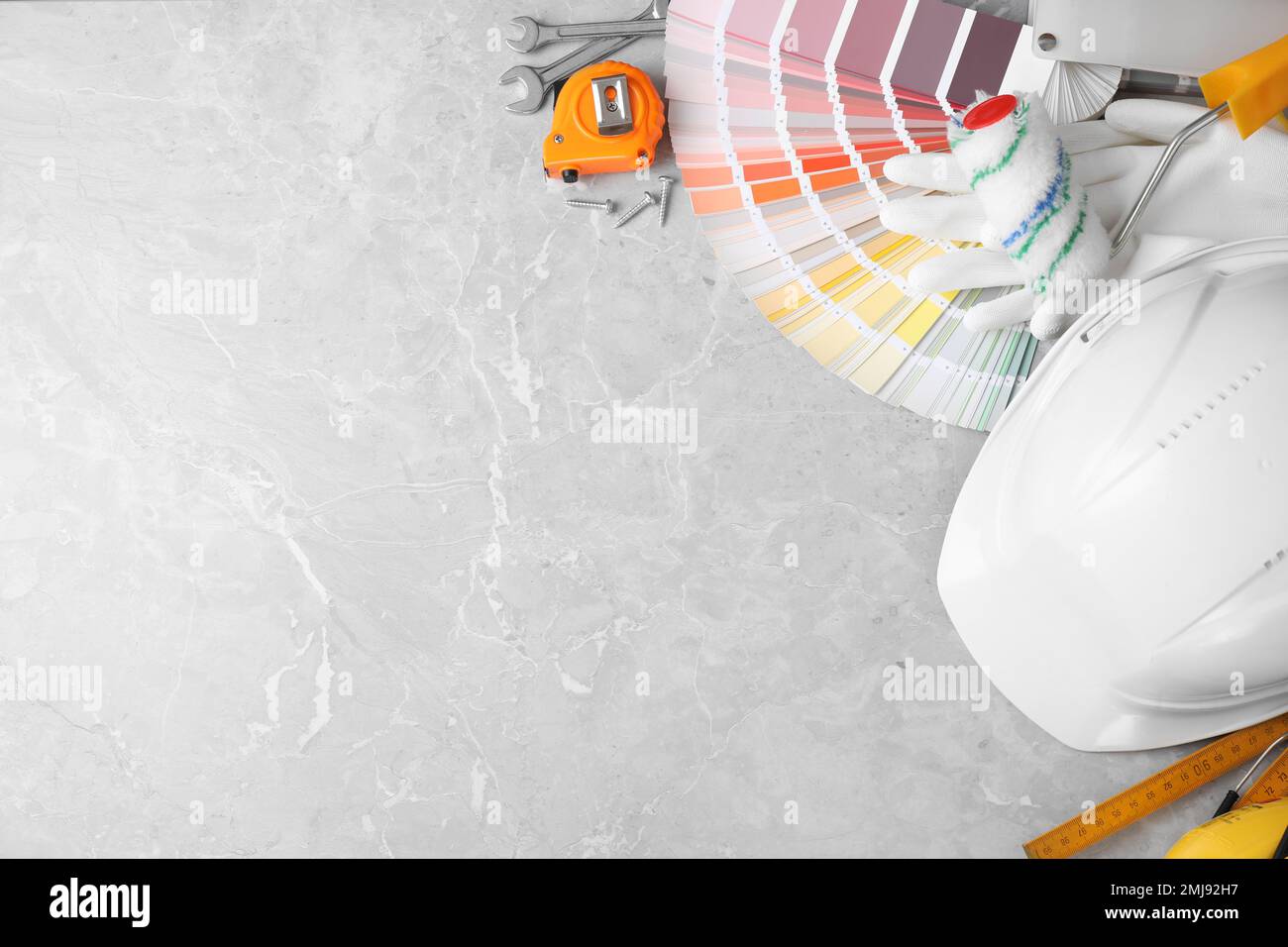 Flat lay composition with different construction tools on marble ...