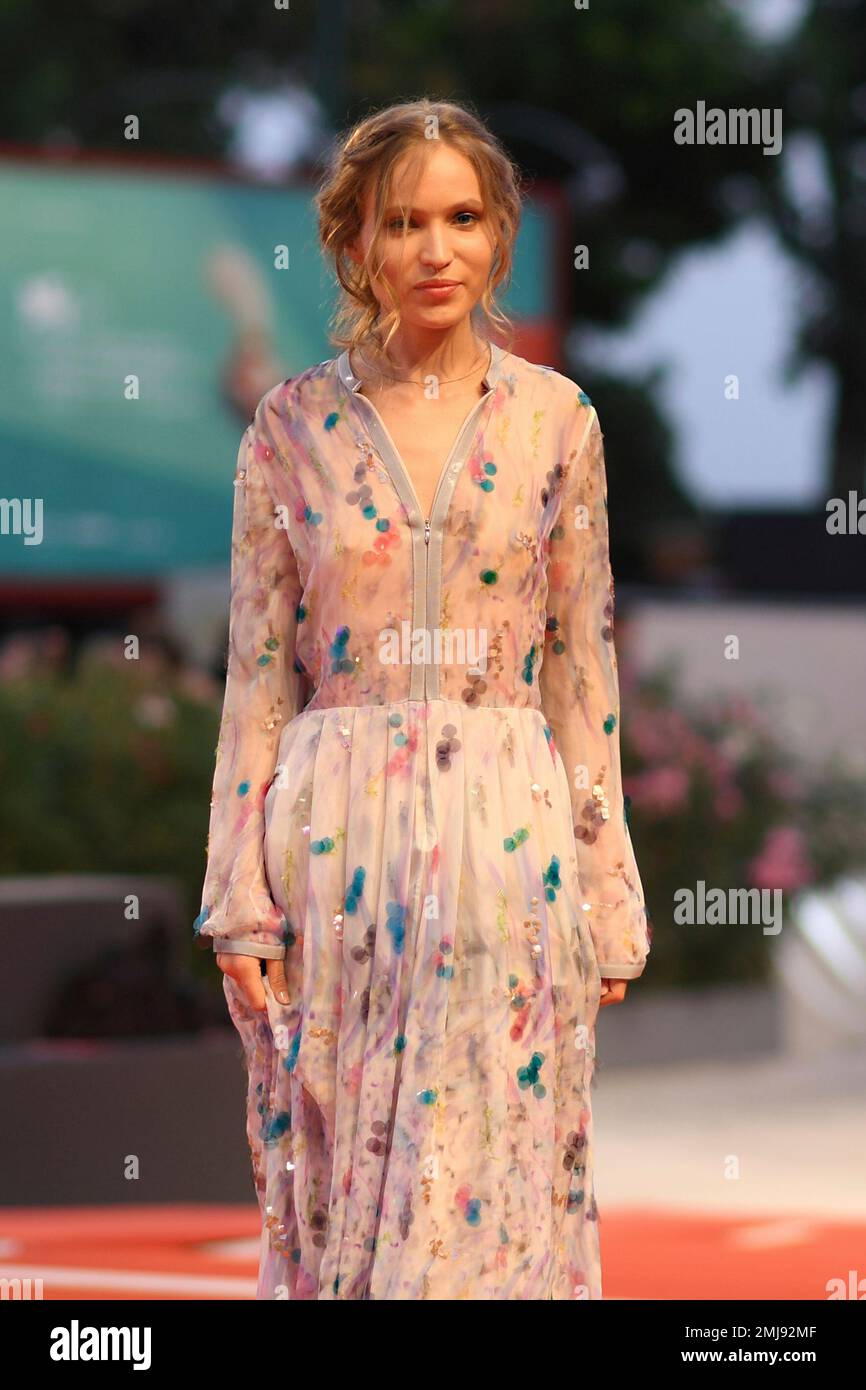 Actress Jessica Cressy poses for photographers upon arrival at the