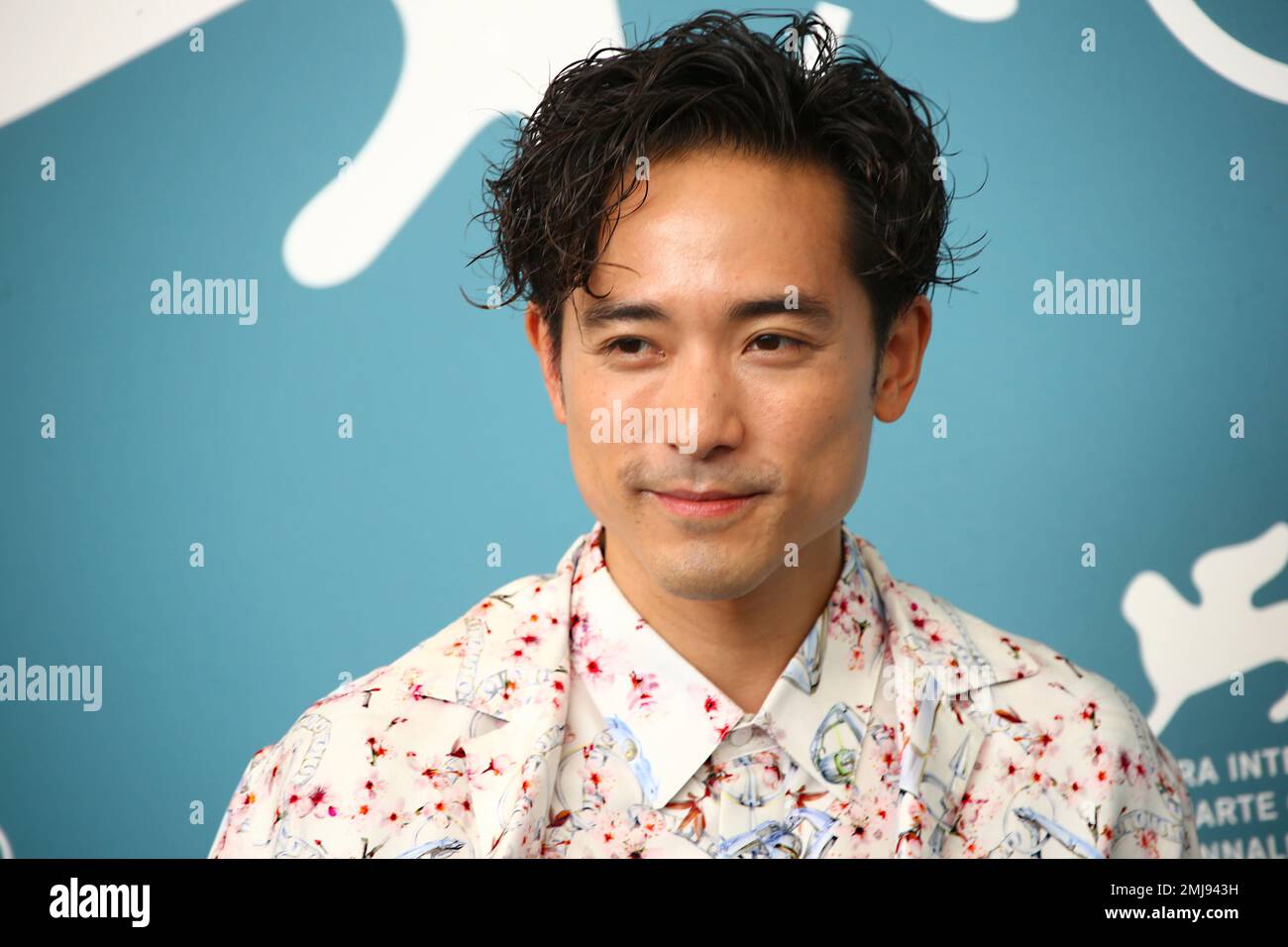 Actor Alex Lam poses for photographers at the photo call for the film