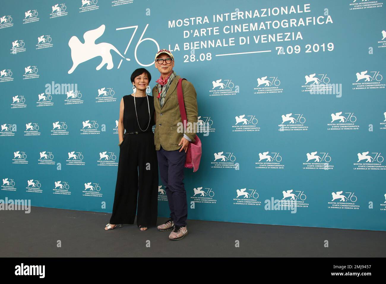 Actress Sylvia Chang, left, and director Yonfan pose for photographers