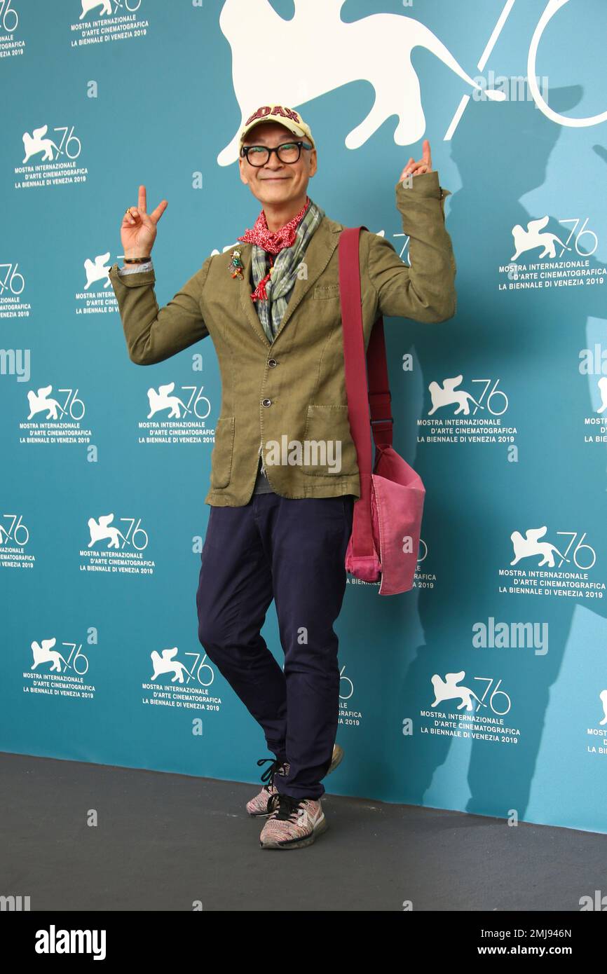Director Yonfan poses for photographers at the photo call for the film