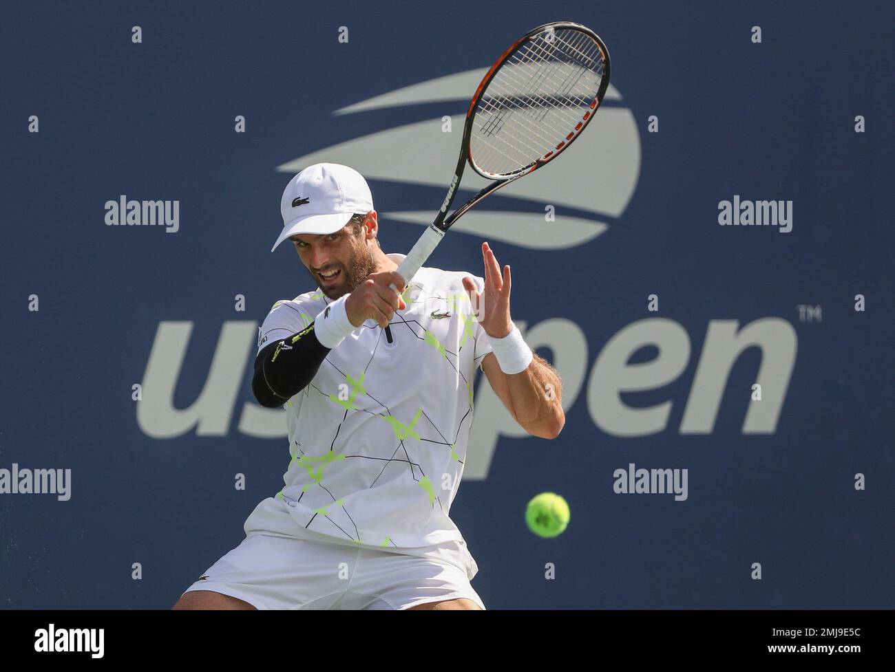 Pablo Andujar, of Spain, returns a shot to Alexander Bublik, of Kazakhstan, during round three of the US Open tennis championships Saturday, Aug