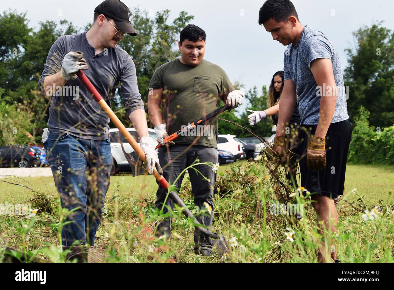 Members of Team Tyndall perform yard maintenance during a volunteer event at the Panama City Rescue Mission Bethel Village in Panama City, Florida, Aug. 26, 2022. The PCRM aims to help people overcome life’s adversities by offering emergency services including food, shelter, clothing, traditional housing and work programs through a collaborative community approach. Stock Photo