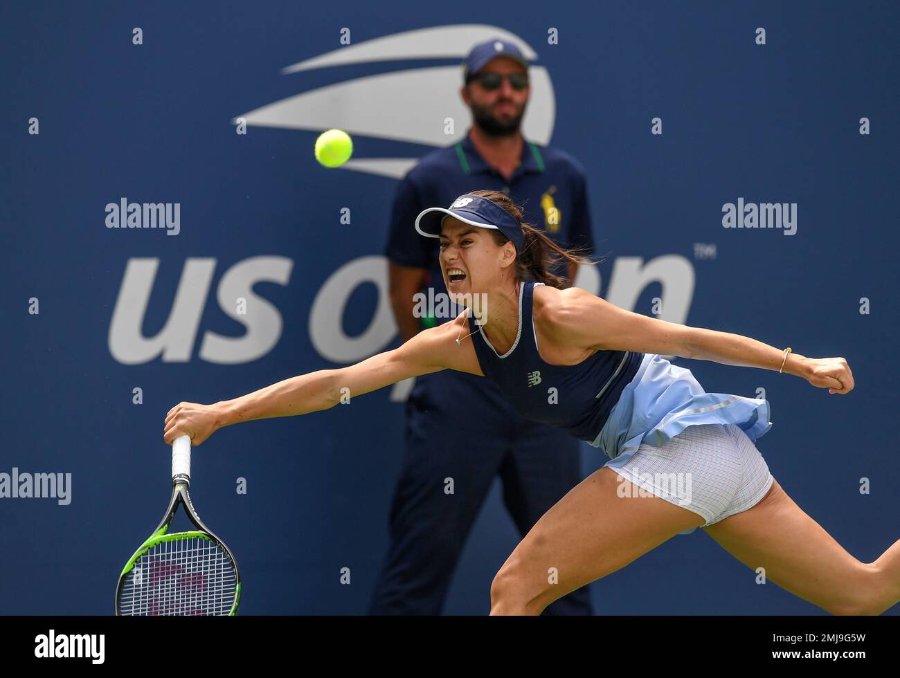Sorana Cirstea, of Romania, returns a shot to Taylor Townsend, of the United States, during round three of the US Open tennis championships Saturday, Aug