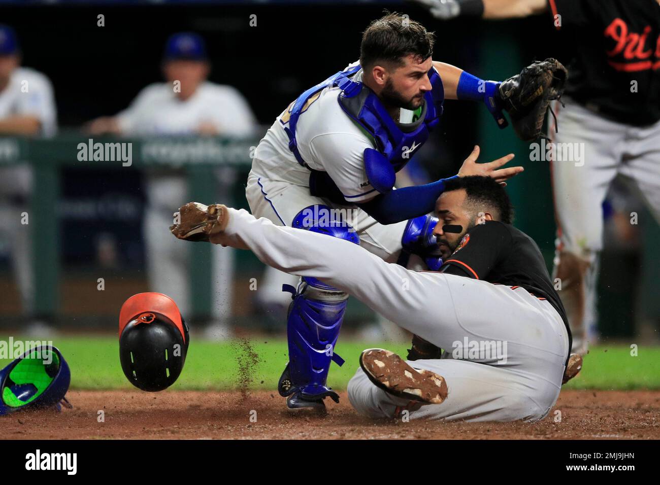 Baltimore Orioles' Renato Nunez, left, is greeted near home plate