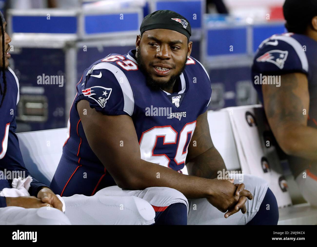 New England Patriots guard Shaq Mason sits on the bench in the