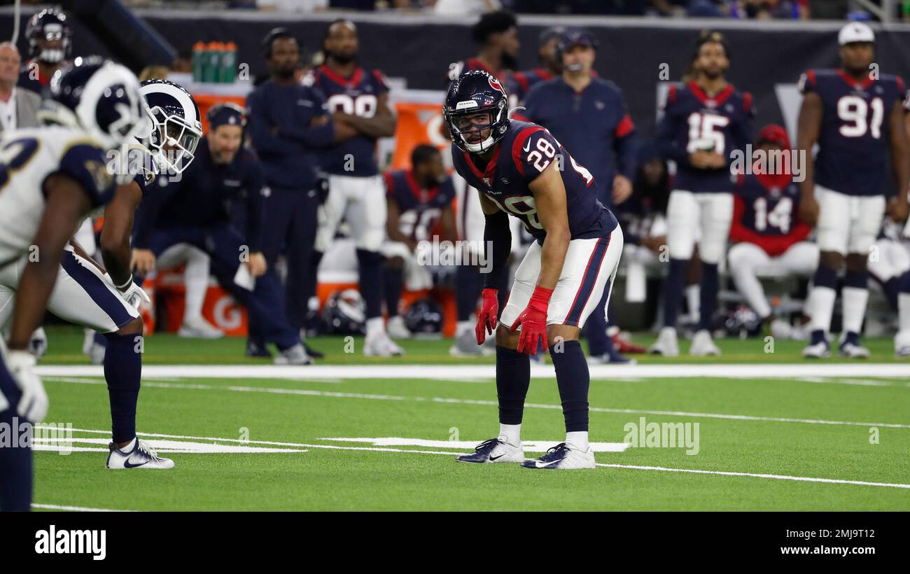 Houston Texans defensive back Xavier Crawford (28) and defensive