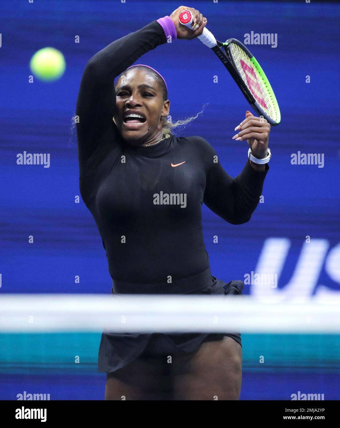 Serena Williams, of the United States, follow through on a return to Caty  McNally, of the United States, during the second round of the U.S. Open  tennis tournament in New York, Wednesday,
