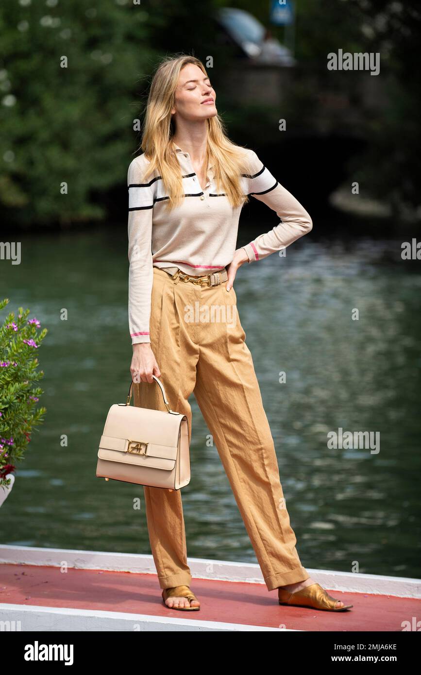 Model Martha Hunt poses for photographers upon arrival at the 76th