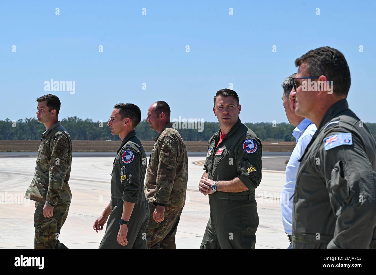 U.S. Air Force Capt. Ross Kohler, middle, 67th Fighter Squadron F15 Eagle pilot, speaks with