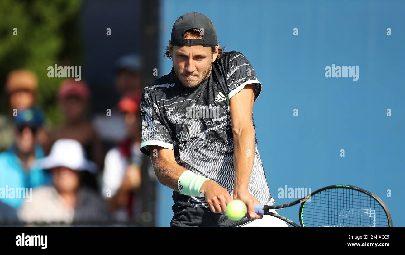 Lucas Pouille, of France, returns a shot to Philipp Kohlschreiber, of  Germany, during the first round of the US Open tennis tournament, Monday,  Aug. 26, 2019, in New York. (AP Photo/Steve Luciano