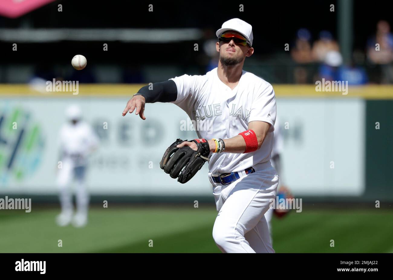 Toronto Blue Jays second baseman Cavan Biggio throws to first for the ...