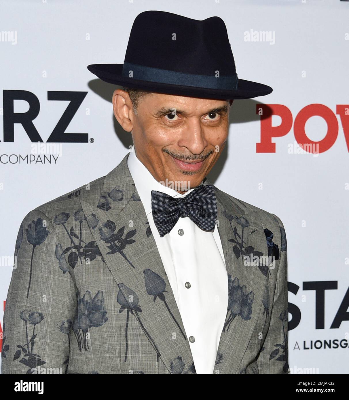 "Keni" Michael Burke, left, and Brieana Burke attend the world