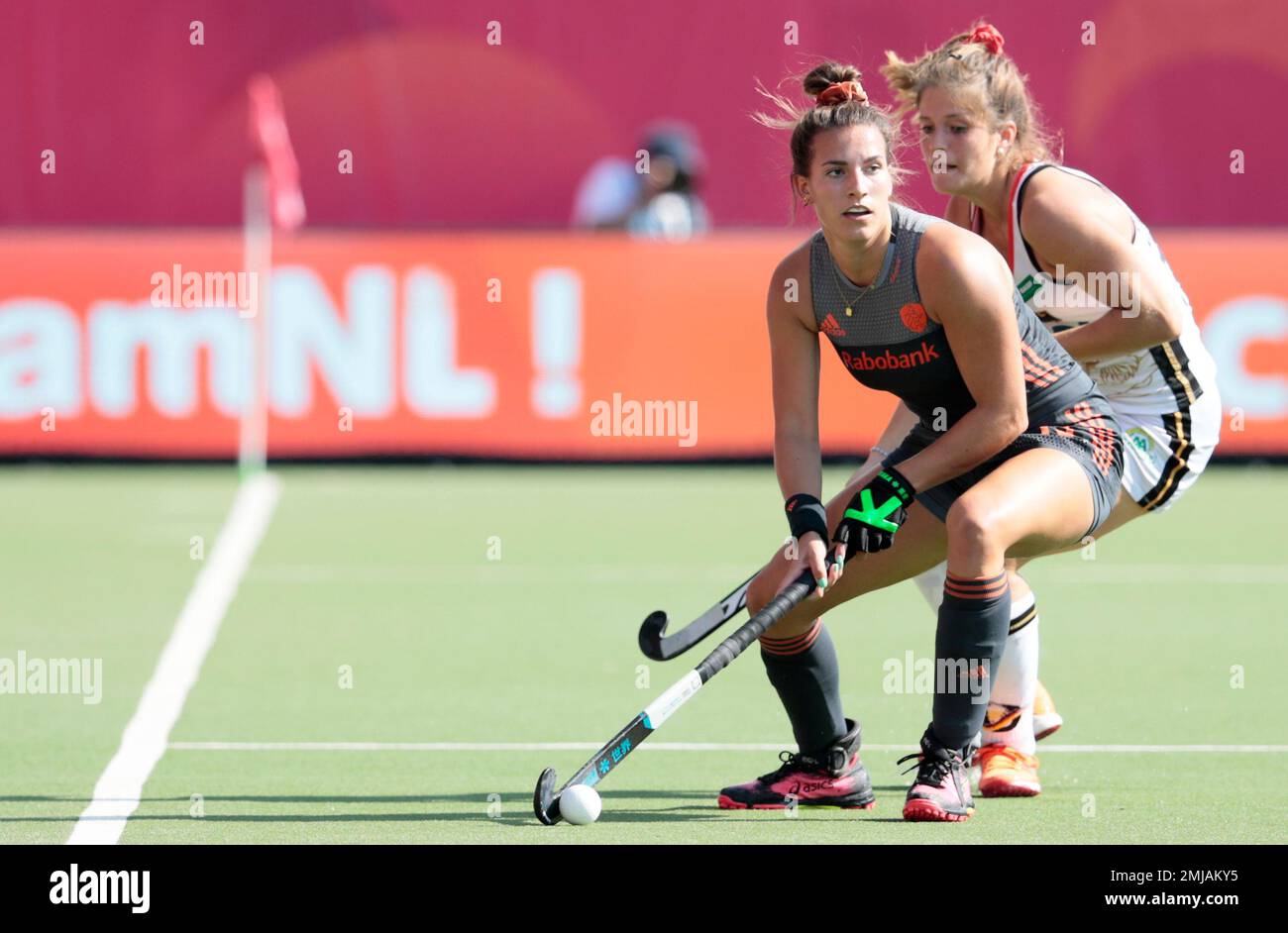 Netherland's Frederique Matla, left, vies for the ball against Germany's  Sonja Zimmermann during a women's European Championship field hockey finals  match between the Netherlands and Germany at the Wilrijkse Plein, Antwerp,  Belgium,