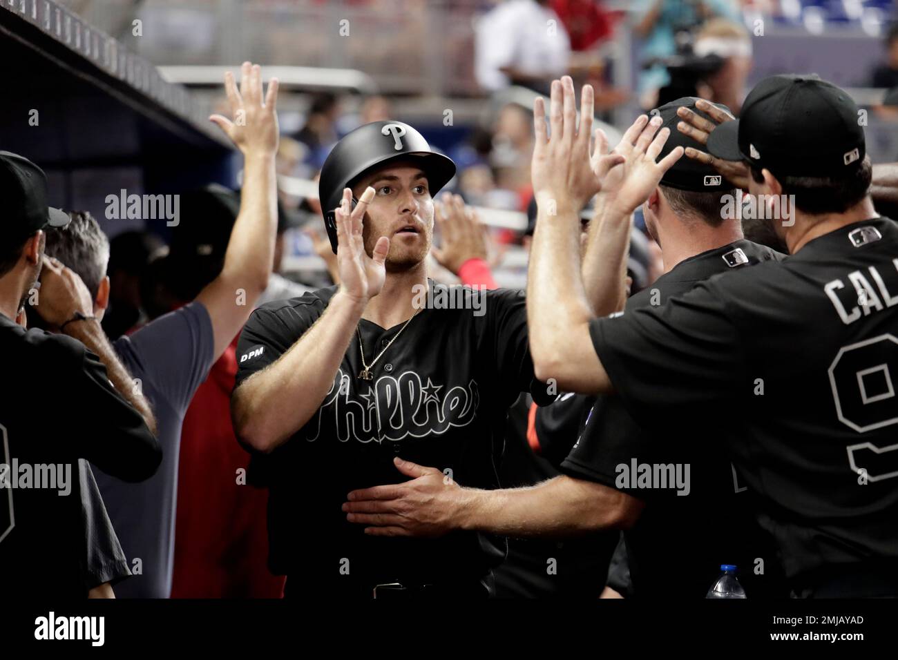 Philadelphia Phillies' Brad Miller is congratulated by his