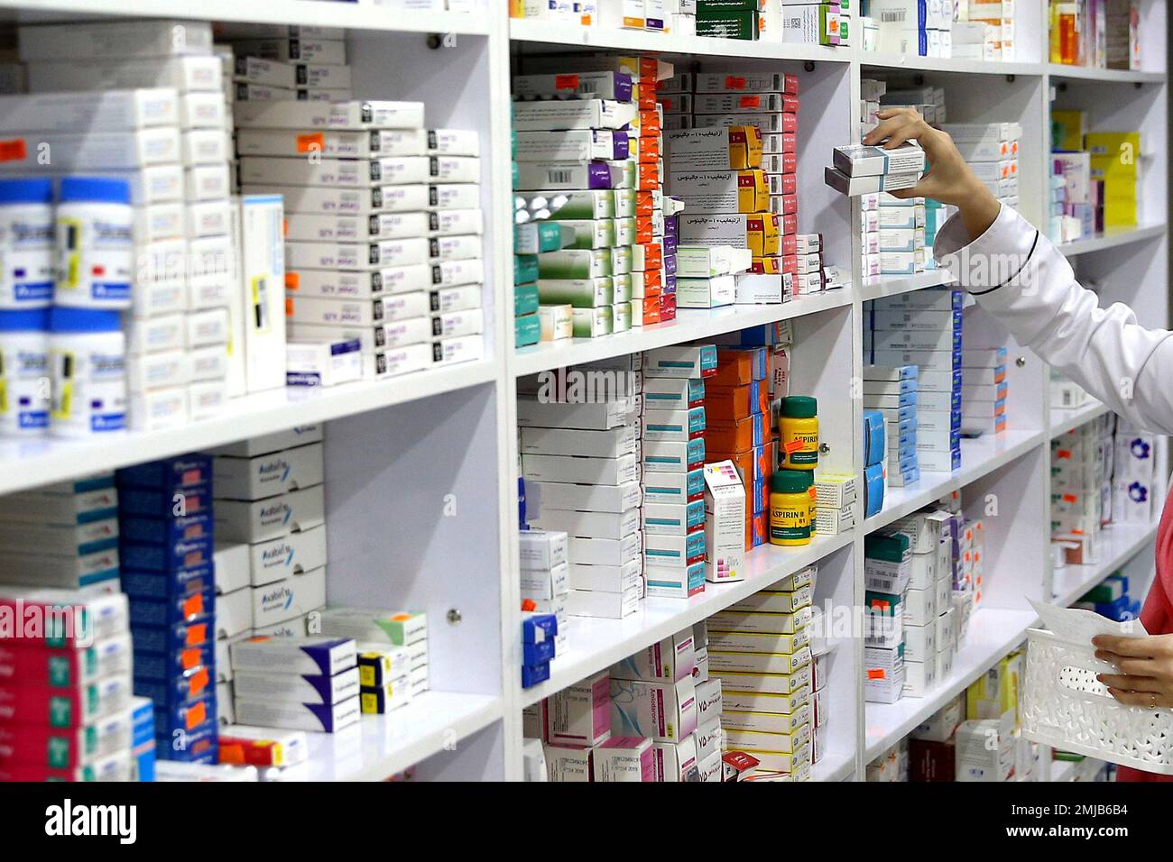 FILE - In this Nov. 5, 2018 file photo, a drugstore employee 
