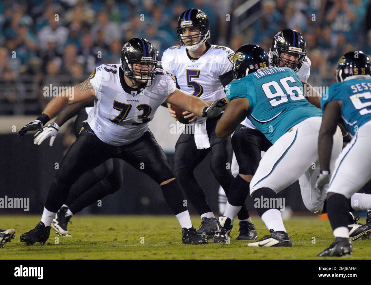 FILE - In this Monday, Oct. 24, 2011, file photo, Baltimore Ravens  offensive guard Marshal Yanda (73), left, blocks against Jacksonville  Jaguars defensive tackle Terrance Knighton (96) during an NFL football game