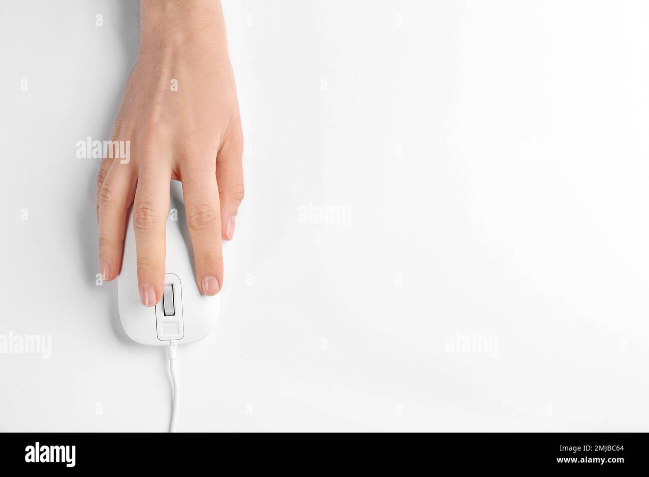 Using Mouse Top View Woman using modern wired optical mouse on white background, top view ...